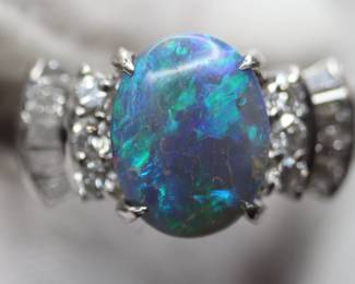 BLACK OPAL RING WITH DIAMOND ACCENTS MADE OF PT900 PLATINUM 1.83CTW, 5.3 GRAMS, SIZE 5.25
