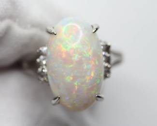 NATURAL AUSTRALIAN WHITE OPAL 5.49CT SET IN PLATINUM WITH .16CTW DIAMOND ACCENTS, 9.23 GRAMS SIZE 6
