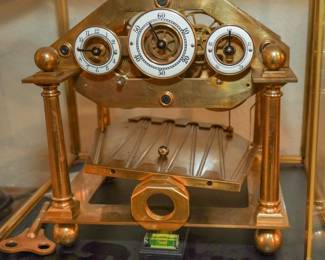 Vintage brass Congreve clock