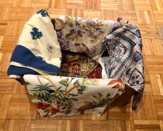 Lots of newer tablecloths - tropical one at front is Tommy Bahama