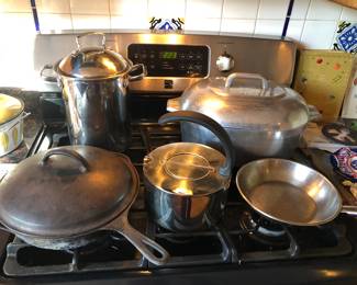 Pots & pans: Belgique tall steamer pot, Griswold #8 2-spout cast iron skillet w/ lid, Dansk chrome tea kettle, Magnalite oval roaster, Cuisinart skillet