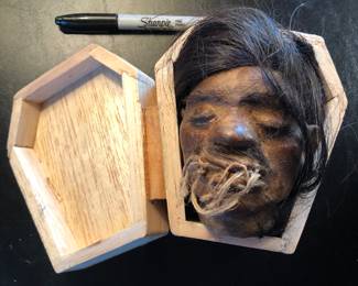 1960s “shrunken head” - souvenir from Peruvian Amazon, 4.5” tall, made of animal hide & real hair. (NOT a human head but still creepy) 