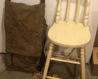 Old backpack (Trager Indian pack board), vintage stool
