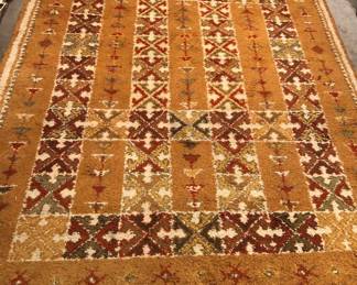 Larger 1960s Moroccan hand woven wool rug (9 x 12 ft. + 6” braided fringe on shorter ends)