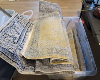 Rugs runners larger rugs.  Some new w padding.