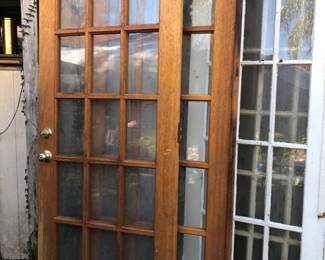 Close up of Mahogany doors, white doors.