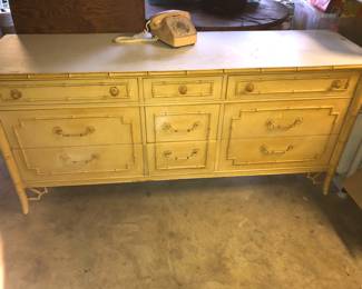 Thomasville Allegro Faux Bamboo.  So vintage and so collectible now.  We have two dressers, two mirrors, a glass top lamp table and a headboard.  