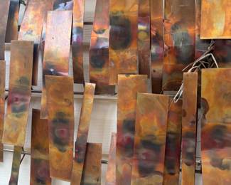 close up of the copper wall art 