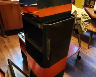 Plastic Red and black storage on rollers modern.
