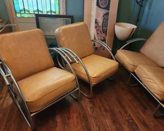 Pair of art Deco, modern tubular Chrome side chairs.