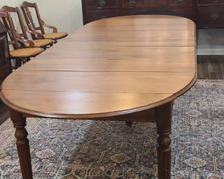 Antique Dining Table on wheels with multiple leafs over 9 feet long!