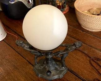 Vintage Art Deco table lamp with dancing flapper girls.  Lamp has been stripped, polished and rewired with new lamp socket, new globe and plug.  It's ready to use.