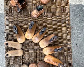 Children’s wood show lasts (molds) and bronze baby shoes