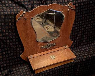 Antique hanging shaving cabinet with mirror.  