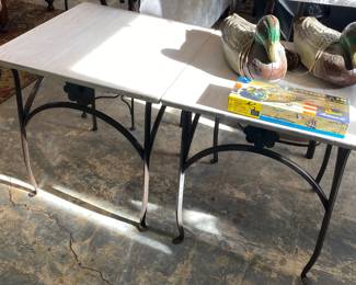 Two custom iron patio sunroom tables approximately 21 inches tall and 19 in.² top • Duck Decoys