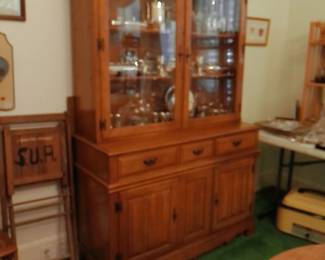 MID CENTURY CHINA CABINET, YORKTOWN BY FLANDERS, SILVERPLATE ITEMS & FOLDING CHAIR FROM URSULINE ACADEMY IN GALVESTON