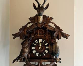 Large antique wood carved cuckoo clock in non-working condition