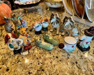 Fun selection of vintage Salt & Pepper shakers including two monkeys hanging on a tree and two dog “pals” arm in arm