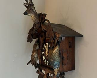 Large antique wood carved cuckoo clock in non-working condition