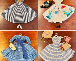 1961 Bubble Cut Titian Red Hair Barbie with original striped swimsuit, Barbie Doll Case and 10 outfits.  Outfits include ‘Evening Splendor’, ‘Friday Night Date Night’, ‘Solo In The Spotlight’, ‘Winter Holiday’, ‘Nighty Negligee’ and more.  There are a few additional accessories & shoes.  THIS WILL BE SOLD AS ONE LARGE COLLECTION. 