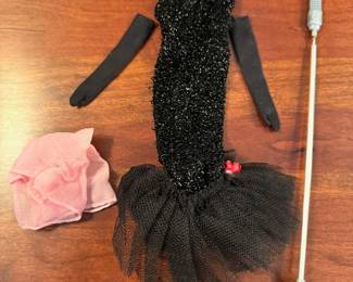 1961 Bubble Cut Titian Red Hair Barbie with original striped swimsuit, Barbie Doll Case and 10 outfits.  Outfits include ‘Evening Splendor’, ‘Friday Night Date Night’, ‘Solo In The Spotlight’, ‘Winter Holiday’, ‘Nighty Negligee’ and more.  There are a few additional accessories & shoes.  THIS WILL BE SOLD AS ONE LARGE COLLECTION. 