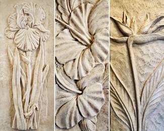 Three large floral relief wall hangings