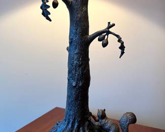 Bronze tone metal table lamp with tortoise shell lamp shade