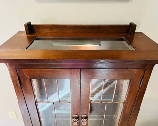 Absolutely stunning Echoes of Chequamegon Bay by Leick Furniture Limited Edition ‘Cornucopia’ lit curio cabinet with copper pulls and window details.  This is cabinet #C056 of only 207 made.