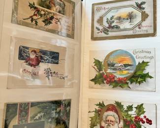 Album of over 100 vintag post cards