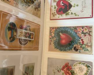 Album of over 100 vintag post cards