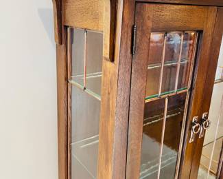 Absolutely stunning Echoes of Chequamegon Bay by Leick Furniture Limited Edition ‘Cornucopia’ lit curio cabinet with copper pulls and window details.  This is cabinet #C056 of only 207 made.