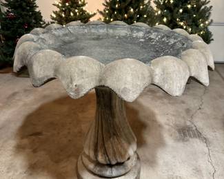 Stately two piece concrete bird bath.  Measurements are 34” diameter x 33” tall