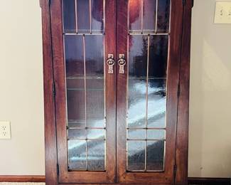 Absolutely stunning Echoes of Chequamegon Bay by Leick Furniture Limited Edition ‘Cornucopia’ lit curio cabinet with copper pulls and window details.  This is cabinet #C056 of only 207 made.