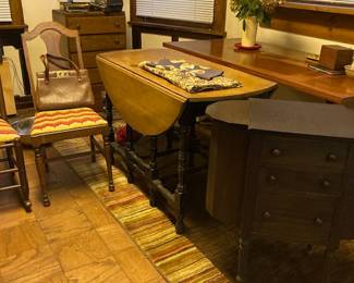 Drop leaf gate leg table and sewing chest.