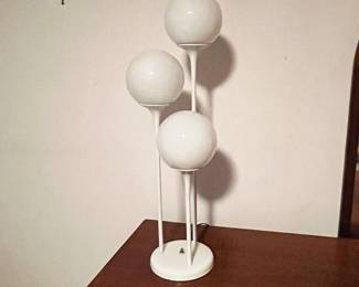 This is a very special treat - this is a Lightolier table lamp with 3 lights.  It is quite hard to find.  There is one for sale on 1st Dibs and this one.  The difference is the price - ours is much less.