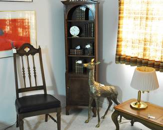 Quite large brass fawn with small bookcase with door