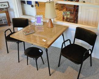 A Mid Century Modern woven raffia top table with glass on top - leather lamp -velvet covered black metal chairs