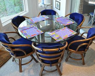 6 rattan swivel chairs with thick glass top and glass "lazy susan" piece