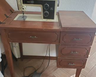 Sears Kenmore sewing machine with table
21x18