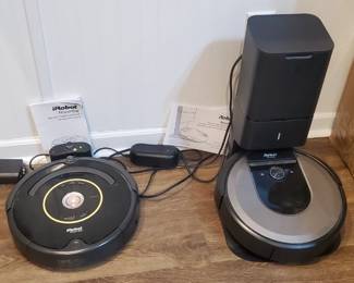 2 iRobot vacuums