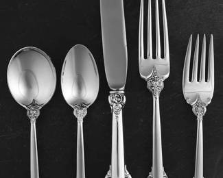 181. Wallace 191pc sterling Grande Baroque flatware set First produced in 1941,  Wallace Grande Baroque silverware was created by William S. Warren to celebrate the art of the Baroque period, and the pinnacle of flatware design.  He drew upon his knowledge of Renaissance and Baroque art to create a true masterpiece in sterling.  