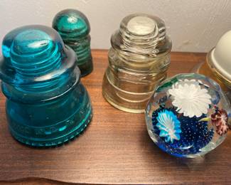 Insulators and paperweights