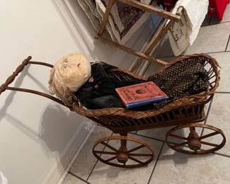Old wicker doll buggy