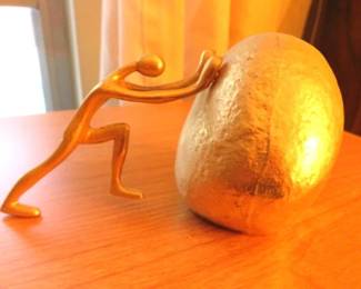 Ted Arnold Sculpture, Man Pushing Rock