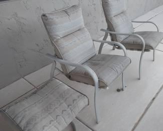 4 chairs with 1 ottoman 