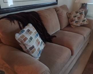 Upholstered tan couch