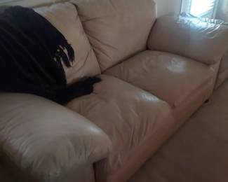 Leather tan loveseat