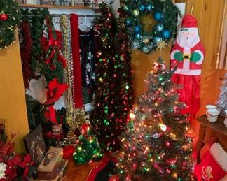 Beautiful PACKED Christmas room with trees, wreaths, Department 56, tons of vintage figurines and ornament. There are also tons of new light strings, light string organizers, village accessories, nativity sets, and more!