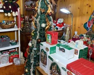 Department 56 and beautiful decorated tree. 