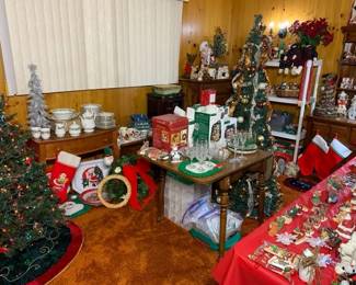 Beautiful PACKED Christmas room with trees, wreaths, Department 56, tons of vintage figurines and ornament. There are also tons of new light strings, light string organizers, village accessories, nativity sets, and more!
